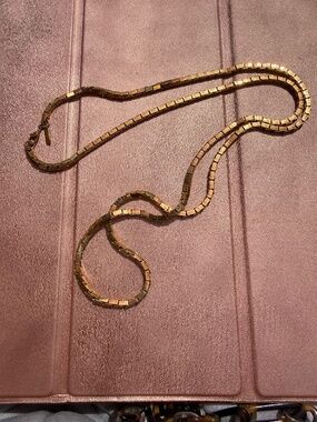 a vintage Monet gold-tone box chain necklace,